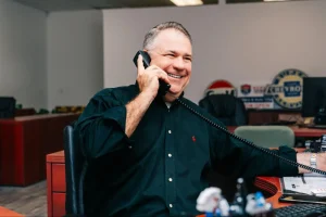 louis-dutel-title-authority-covington-on-phone