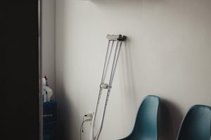Photo by Juan Manuel Montejano Lopez from Pexels: https://www.pexels.com/photo/crutches-leaning-on-white-wall-13185365/