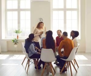 adults participating in a structured group therapy session to build communication skills and reduce social anxiety
