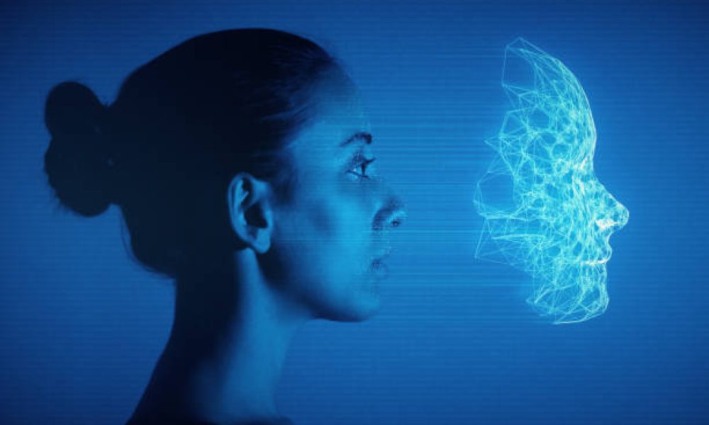 Female human face with 3d mesh and recognition marks.