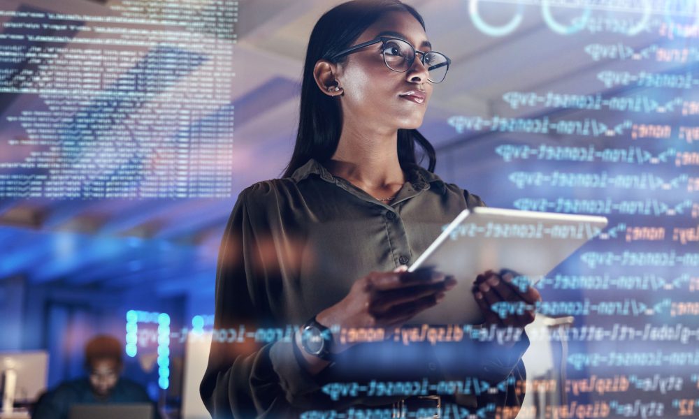 Software, coding hologram and woman on tablet thinking of data analytics, digital technology and night overlay. Programmer or IT person in glasses on 3d screen, programming and cybersecurity research.