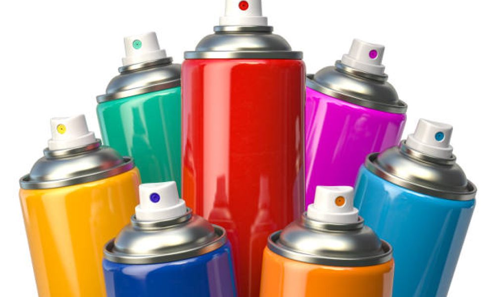 Colorful graffity spray paint cans or bottles of aerosol isolated on white. 3d illustration