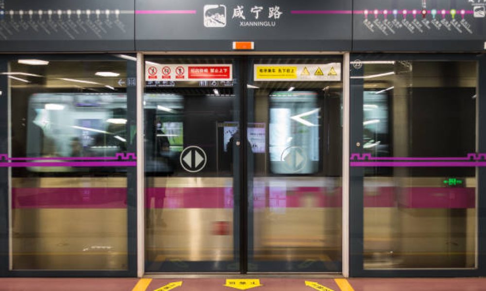Xian Ning Lu Station with Passing Train Closed Doors in Xi'an, China, March 2018
