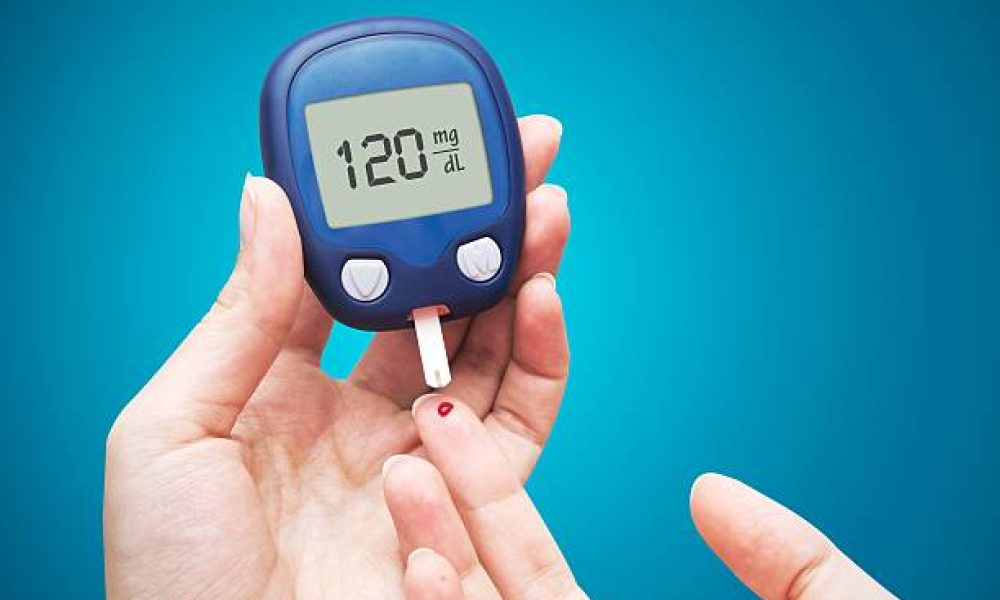 Woman doing blood sugar test