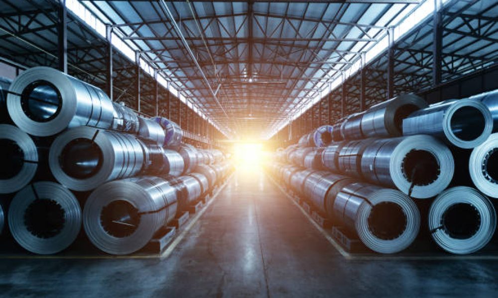 Roll of galvanized steel sheet at metalworking factory.