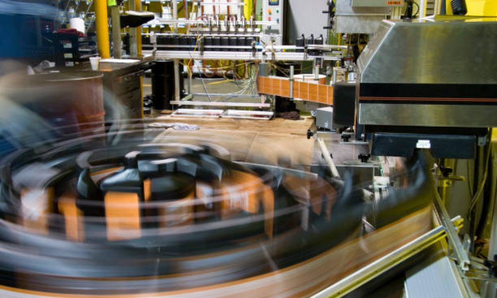 Turntable of bottling line at a lubricant manufacturing facility. More from this series: