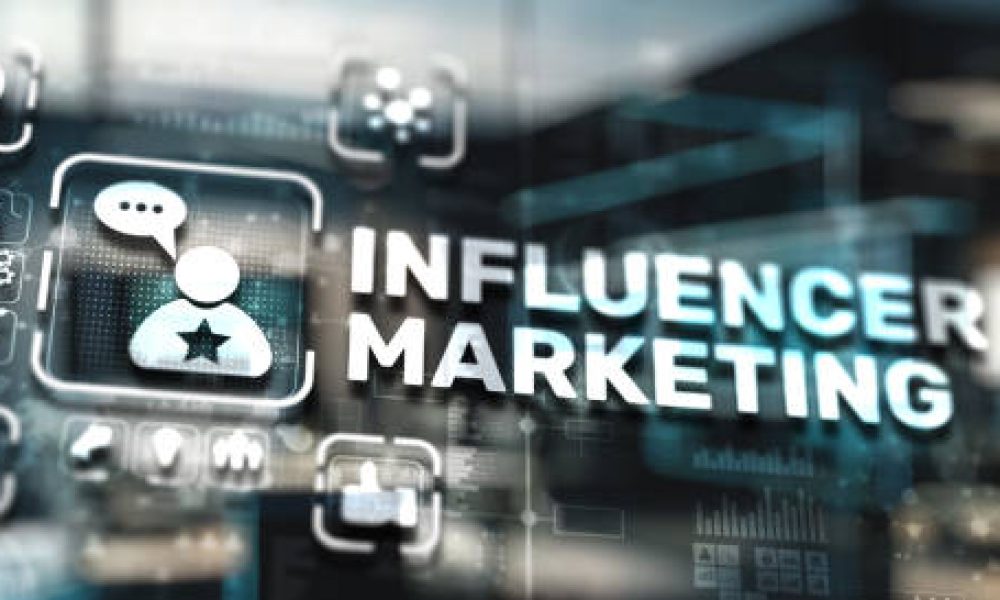 Influencer marketing concept. Promotion of goods or services through influencers.
