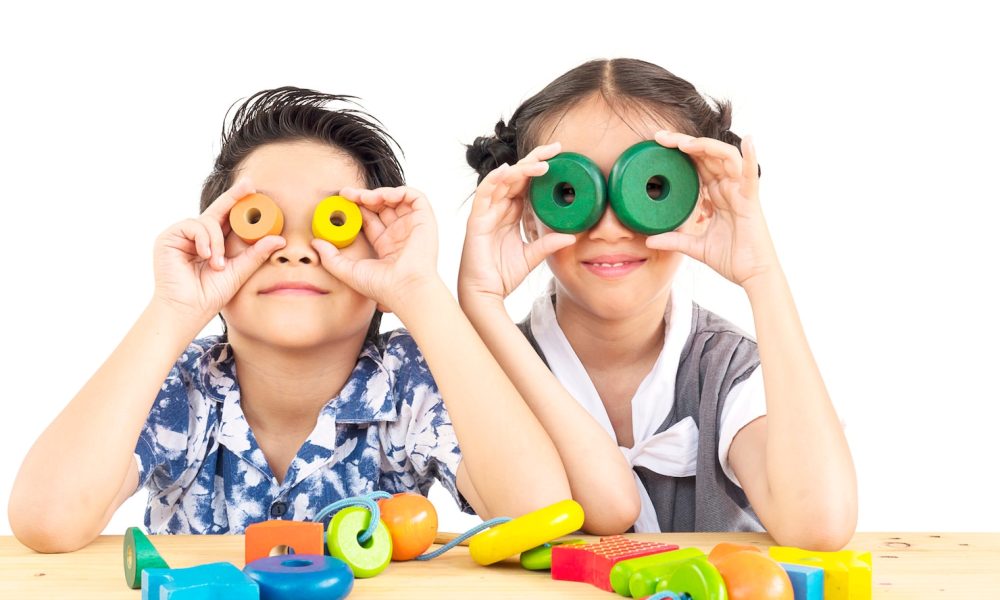 asian-boy-girl-are-happily-playing-colorful-wood-block-toy_1150-6274[1]