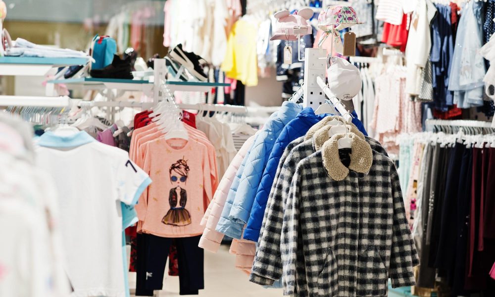 children-s-bright-clothes-hang-display-baby-clothing-store-girls-section_627829-6483[1]