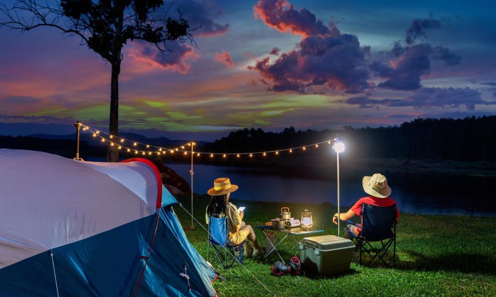 couple-tourists-enjoying-camping-by-lake_335224-1342[2]