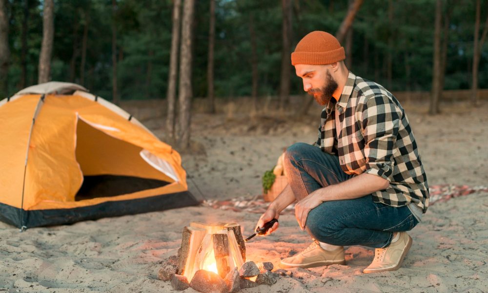 crouching-man-starting-bonfire_23-2148223476[1]