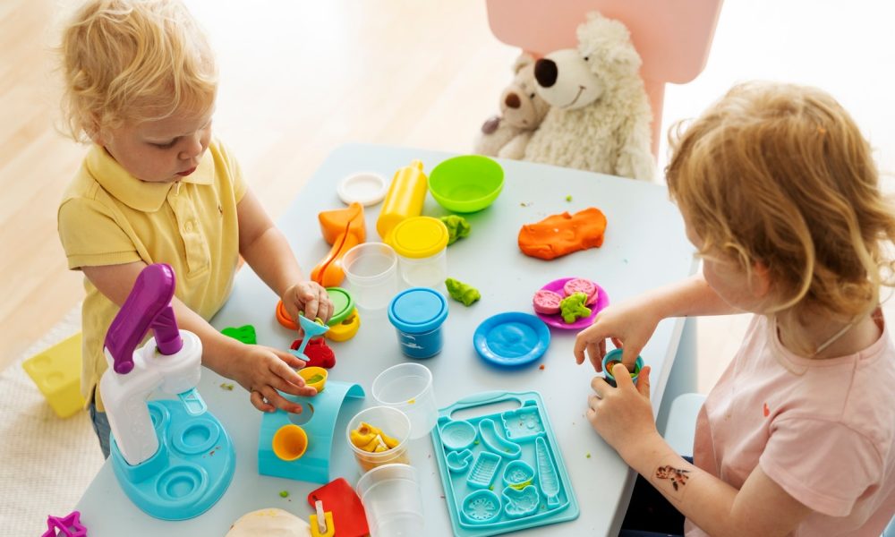 high-angle-kids-playing-together_23-2149513094[1]