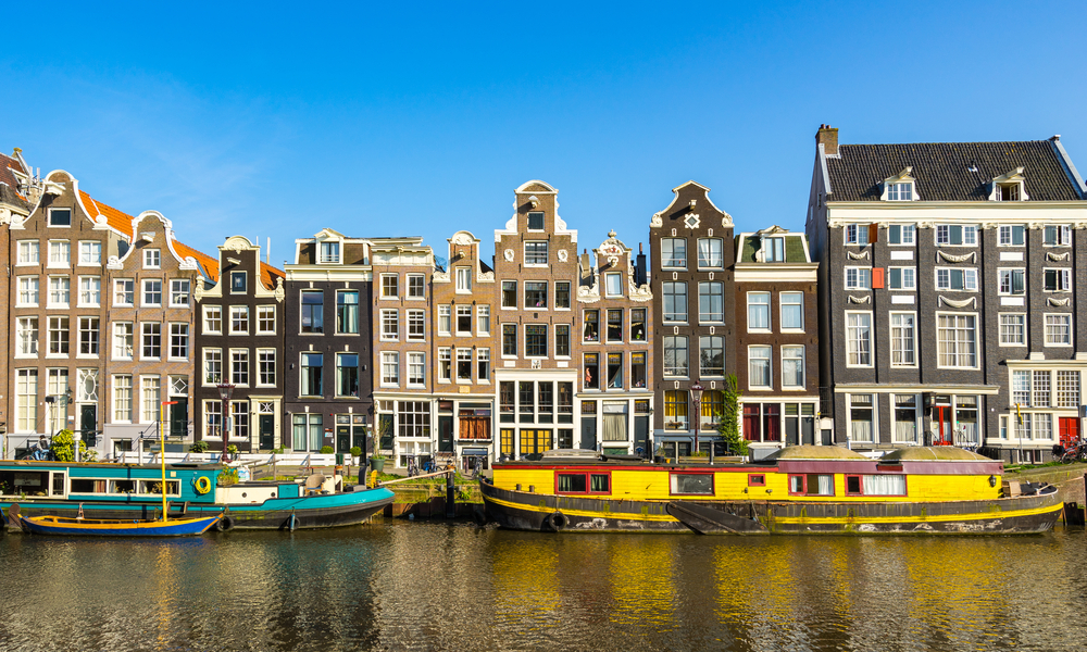 Amsterdam Netherlands canal houses representing the Dutch property market that expats navigate when buying real estate in the Netherlands