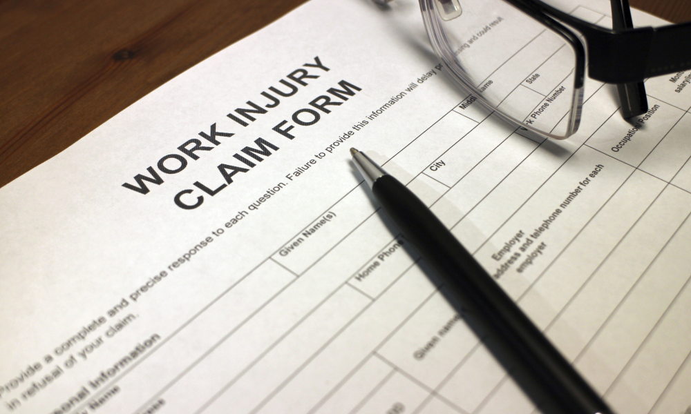 injured employee at workplace representing the workers compensation lawyer Roanoke VA injured workers need to navigate Virginia's workers compensation system