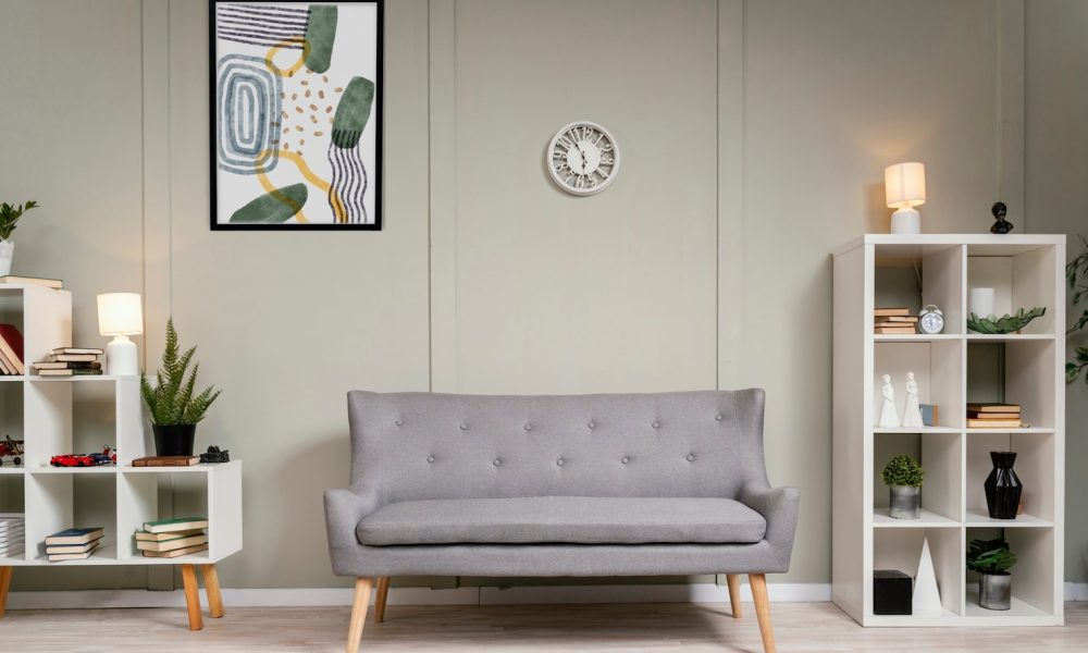 interior-design-with-photoframes-grey-couch_23-2149385445[1]