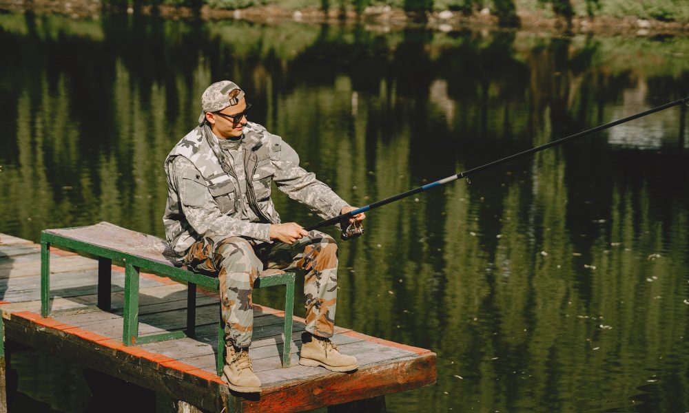 man-fishing-holds-angling-rod_1157-38073[1]