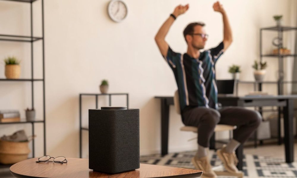 man-using-smart-speaker-while-dancing_23-2149036862[1]