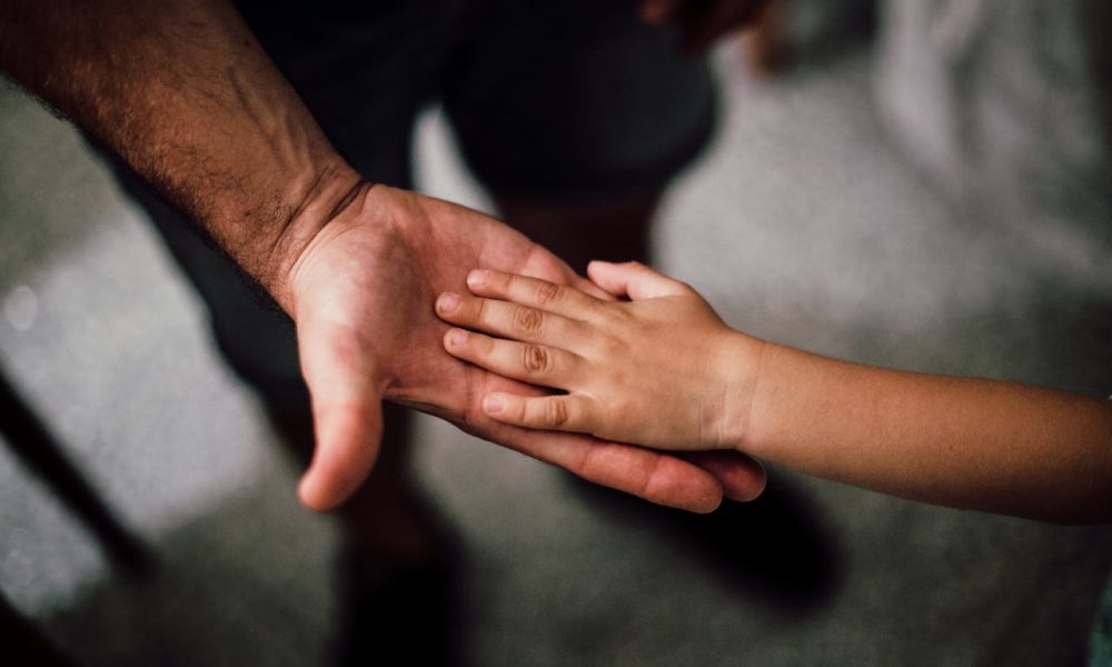 Photo by Juan Pablo Serrano : https://www.pexels.com/photo/father-and-child-s-hands-together-1250452/