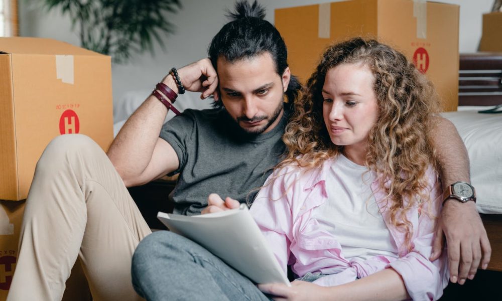Photo by Ketut Subiyanto: https://www.pexels.com/photo/thoughtful-couple-writing-in-notebook-while-moving-house-4246012/