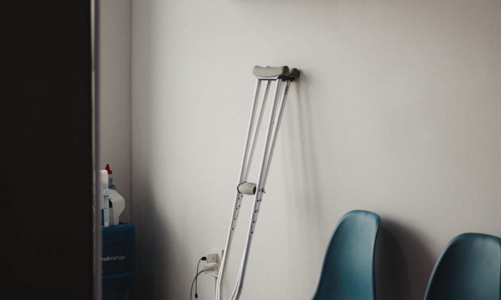 Photo by Juan Manuel Montejano Lopez from Pexels: https://www.pexels.com/photo/crutches-leaning-on-white-wall-13185365/