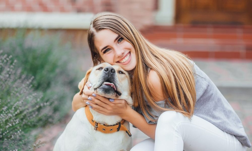 young-woman-with-retriever-walk-summer-park_496169-2482[1]
